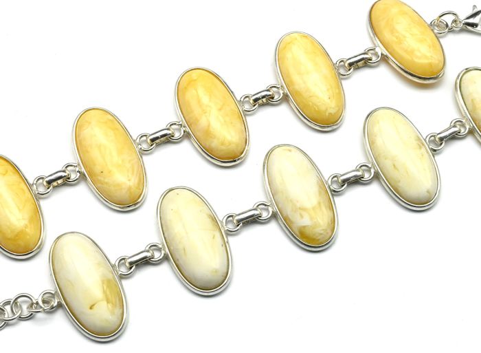 Bracelet with amber in silver 5 ovals 31*16mm milky, 19cm