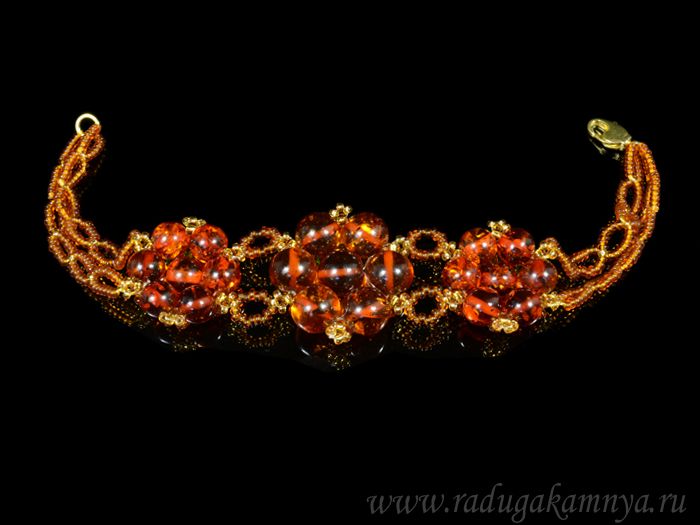 Bracelet with amber, beads and zircon "3 flowers" cognac, 19cm.