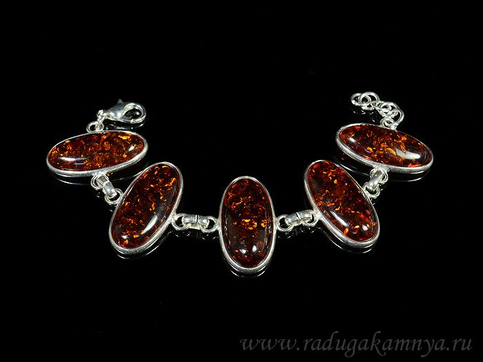 Bracelet with amber in silver 5 ovals 31*16mm cognac, 19cm.