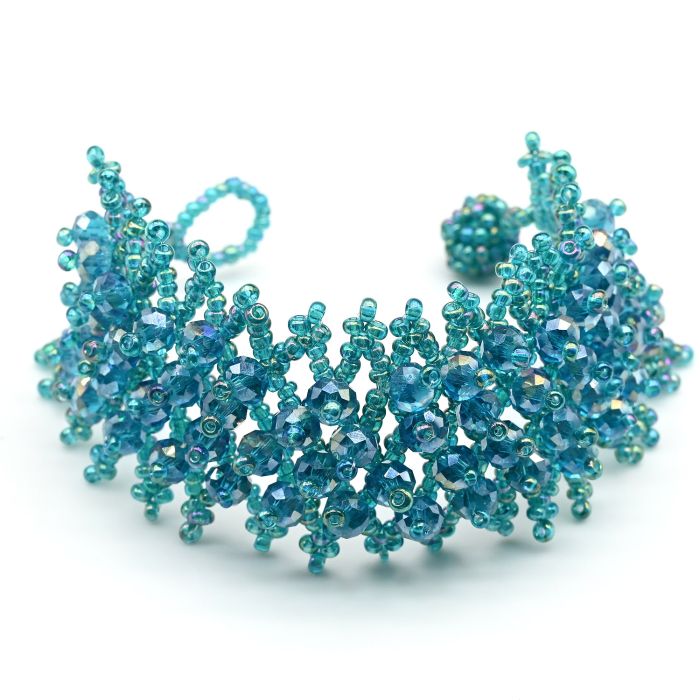 Braided beaded bracelet with zircon color turquoise, 18cm.