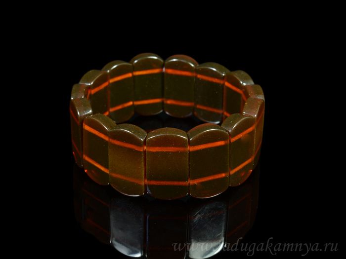 Bracelet made of amber rectangle covered with 25*13mm t.cognac, 26.1gr.