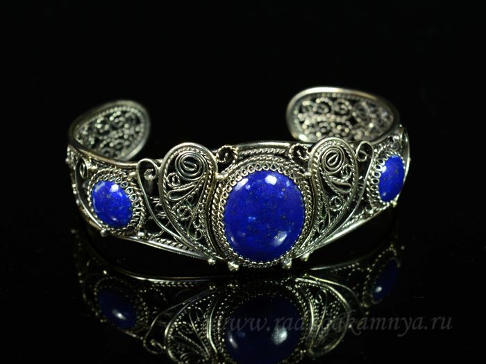 The bracelet is lapis lazuli.