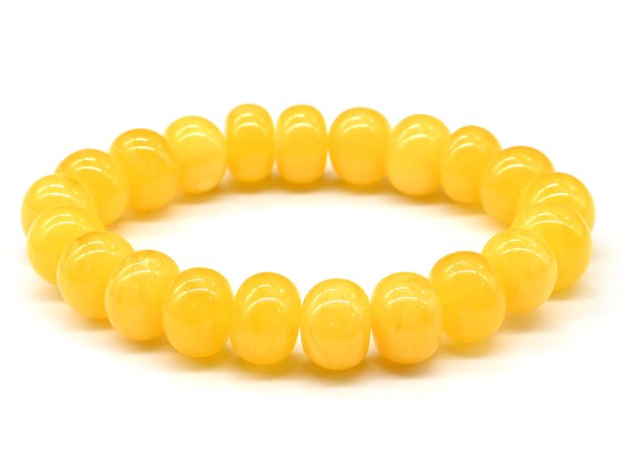 Bracelet made of amber discs 13mm honey-milk