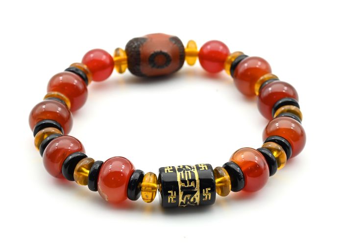 Bracelet with ji bead "Three eyes" barrel 13*18mm with carnelian rondel 12*8mm