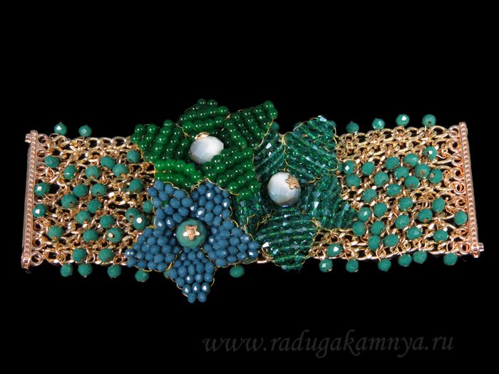 A bracelet with zircons on metal.The base of the "Three flowers" is the author's, 19cm